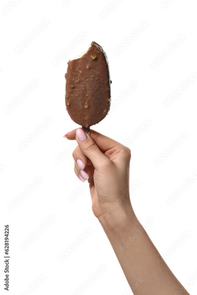 Woman holding tasty bitten chocolate covered ice cream on white background