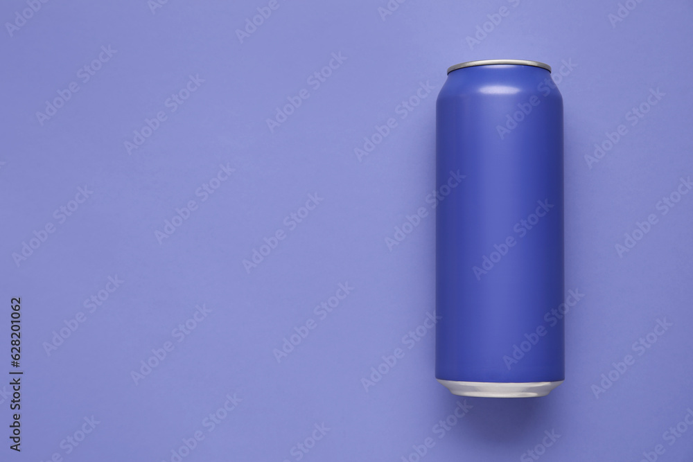 Can of soda on lilac background