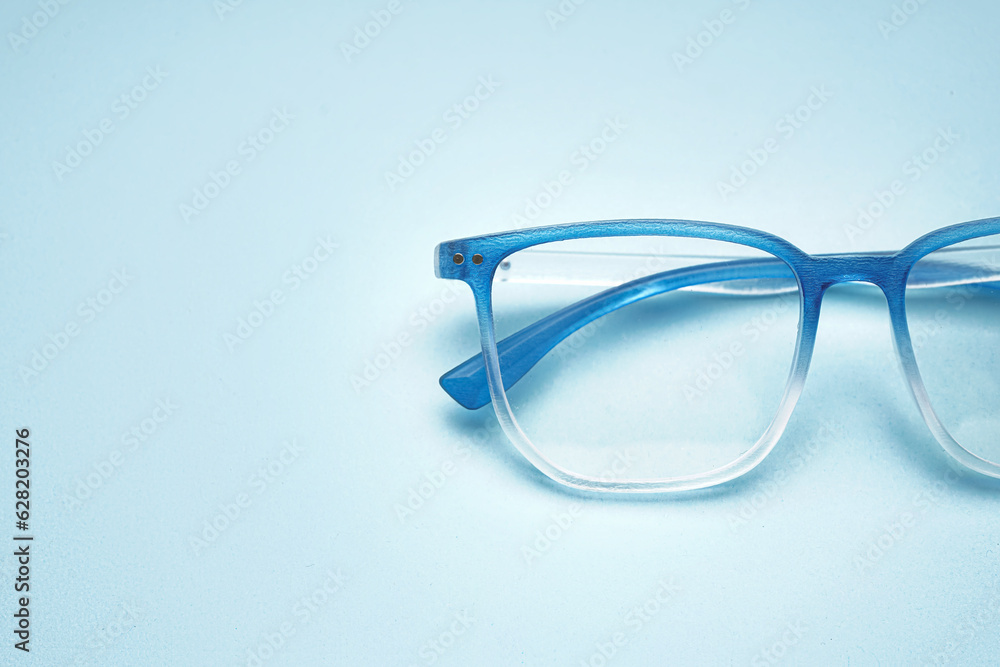 New gradient eyeglasses on pale blue background