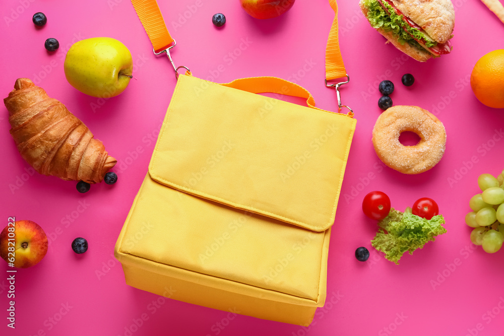 Lunch box bag with different tasty food on pink background