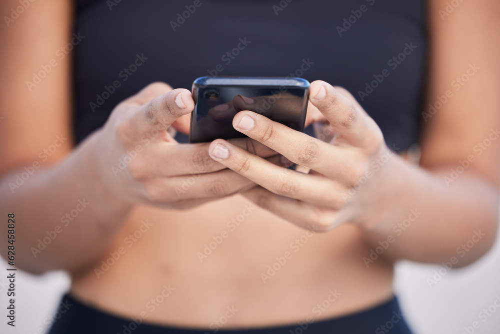 Woman, phone and hands typing for fitness communication, social media or outdoor networking. Closeup