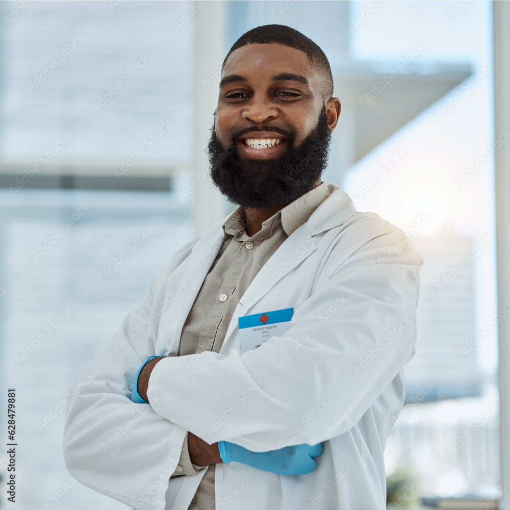 Black man, doctor and portrait with arms crossed in hospital for healthcare services, surgery and co