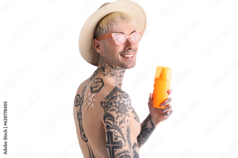 Tattooed man with sunscreen cream on white background