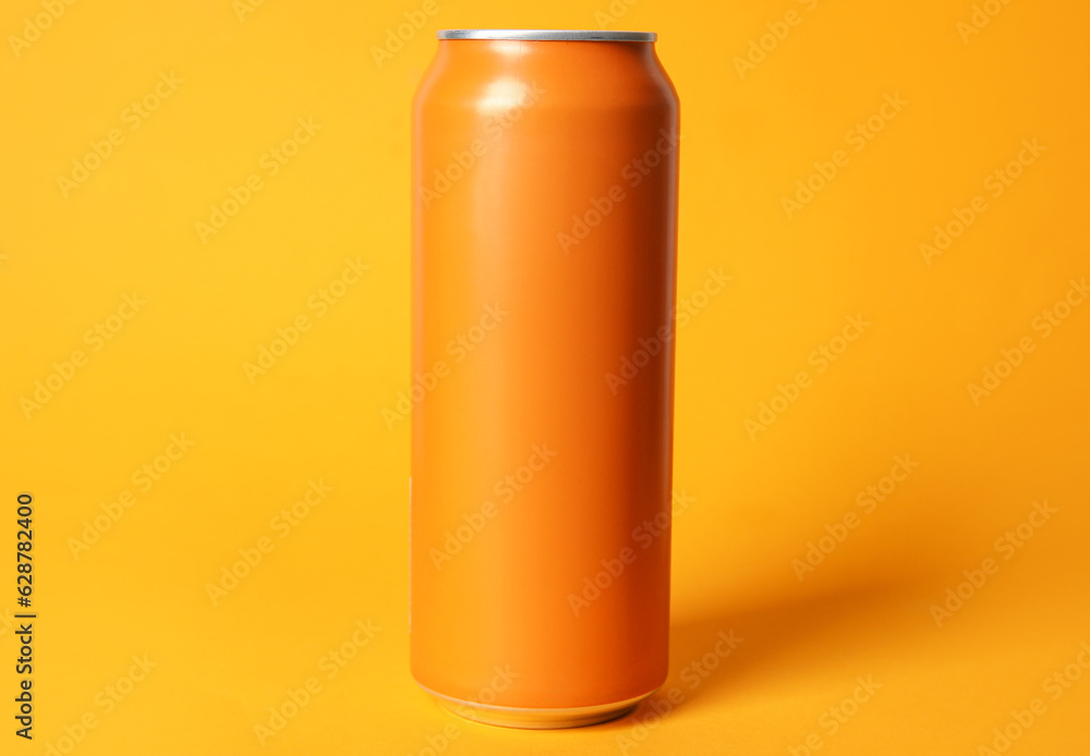 Can of fresh soda on orange background