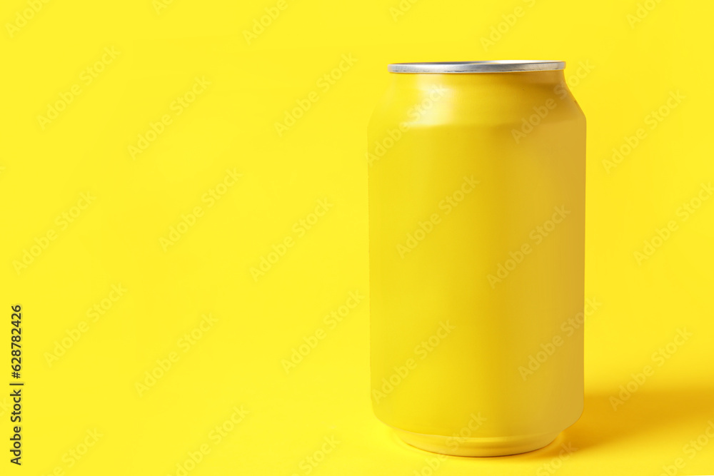 Can of fresh soda on yellow background