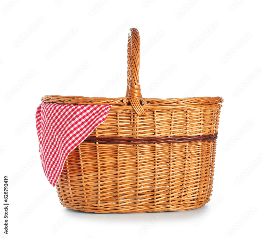 Wicker picnic basket with napkin isolated on white background