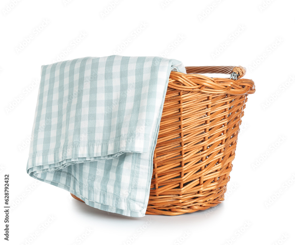 Wicker picnic basket with clean napkin isolated on white background