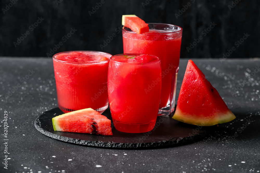 Glasses of tasty watermelon fresh on table