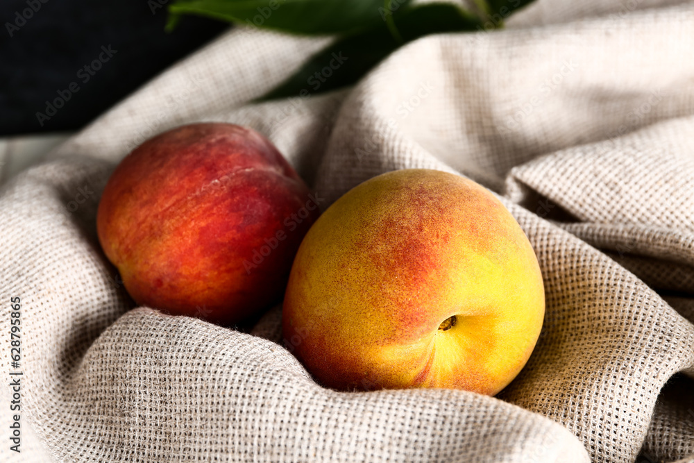 Sweet peaches on napkin, closeup