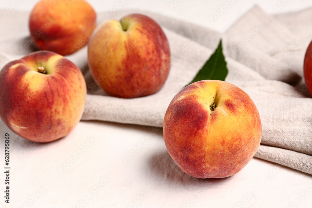 Sweet peaches on white background