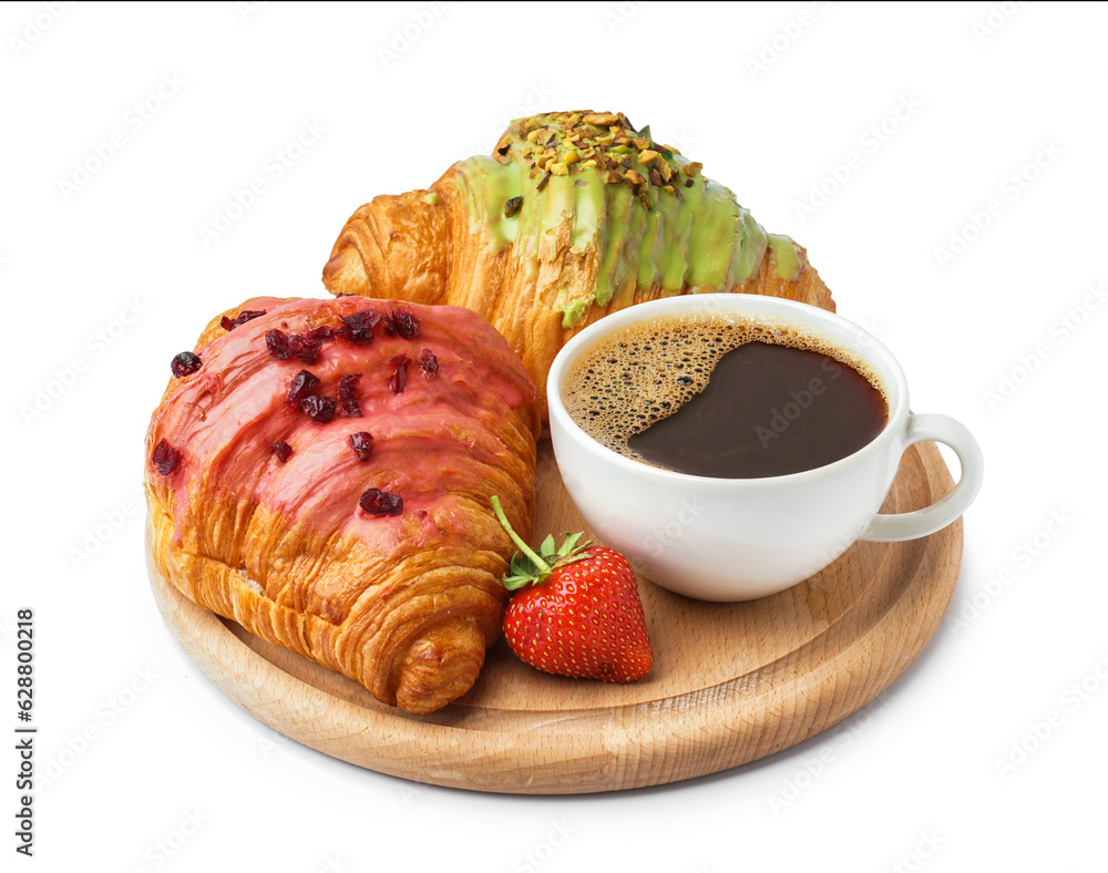 Wooden board with tasty sweet croissants and cup of coffee isolated on white background