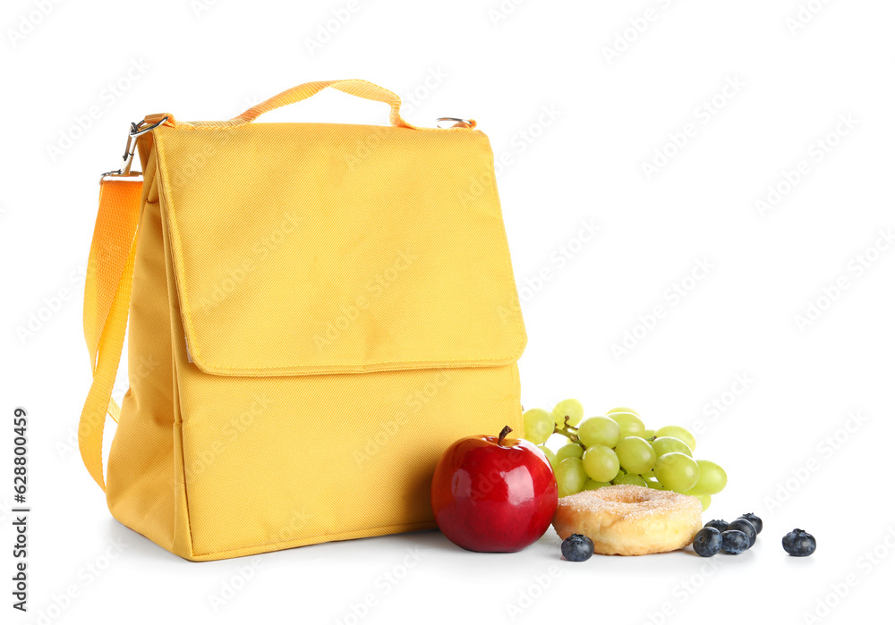 Lunch box bag with fruits and doughnut isolated on white background