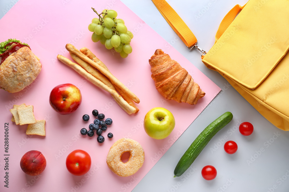 Lunch box bag with different tasty food on color background