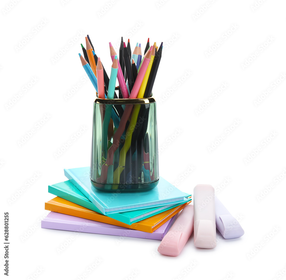 Cup with school stationery and notebooks on white background