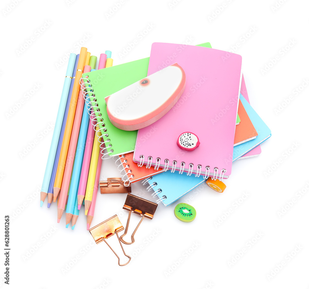 Notebooks and school stationery on white background