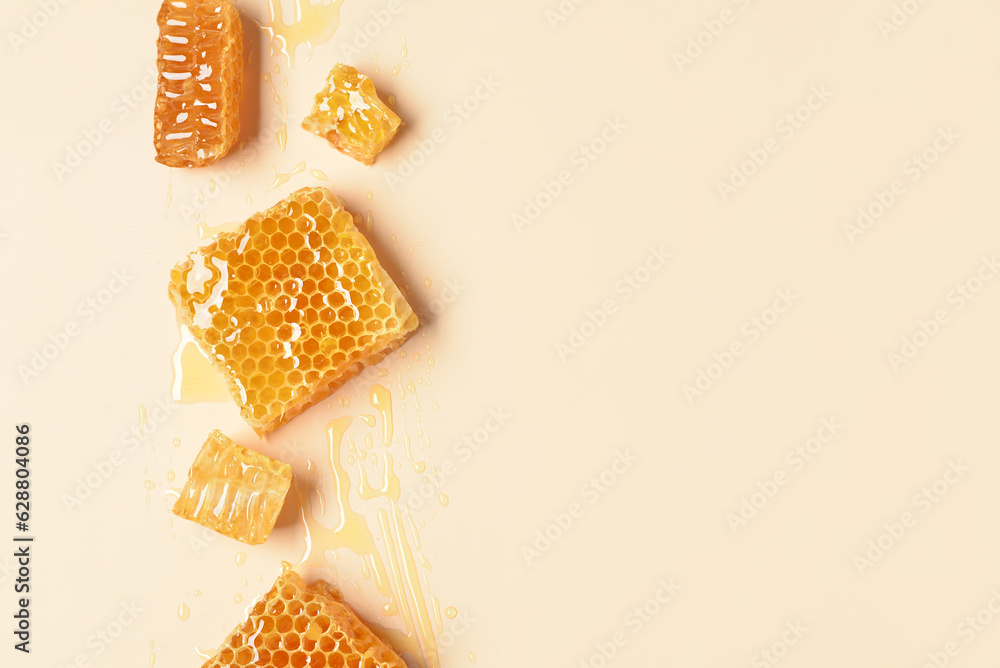 Sweet honeycombs on yellow background