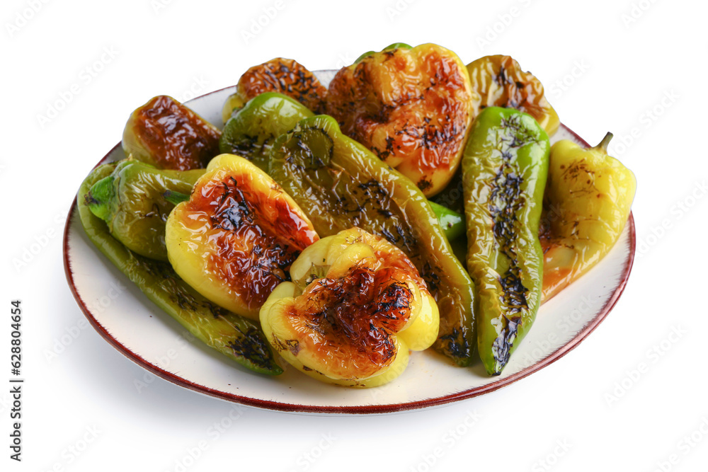 Plate with different grilled peppers on white background