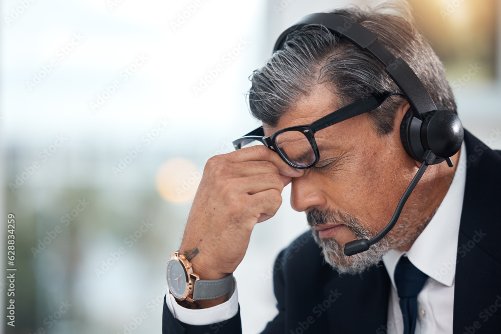 Stress, sales and man in a call center with a headache from telemarketing or technical support. Sad,