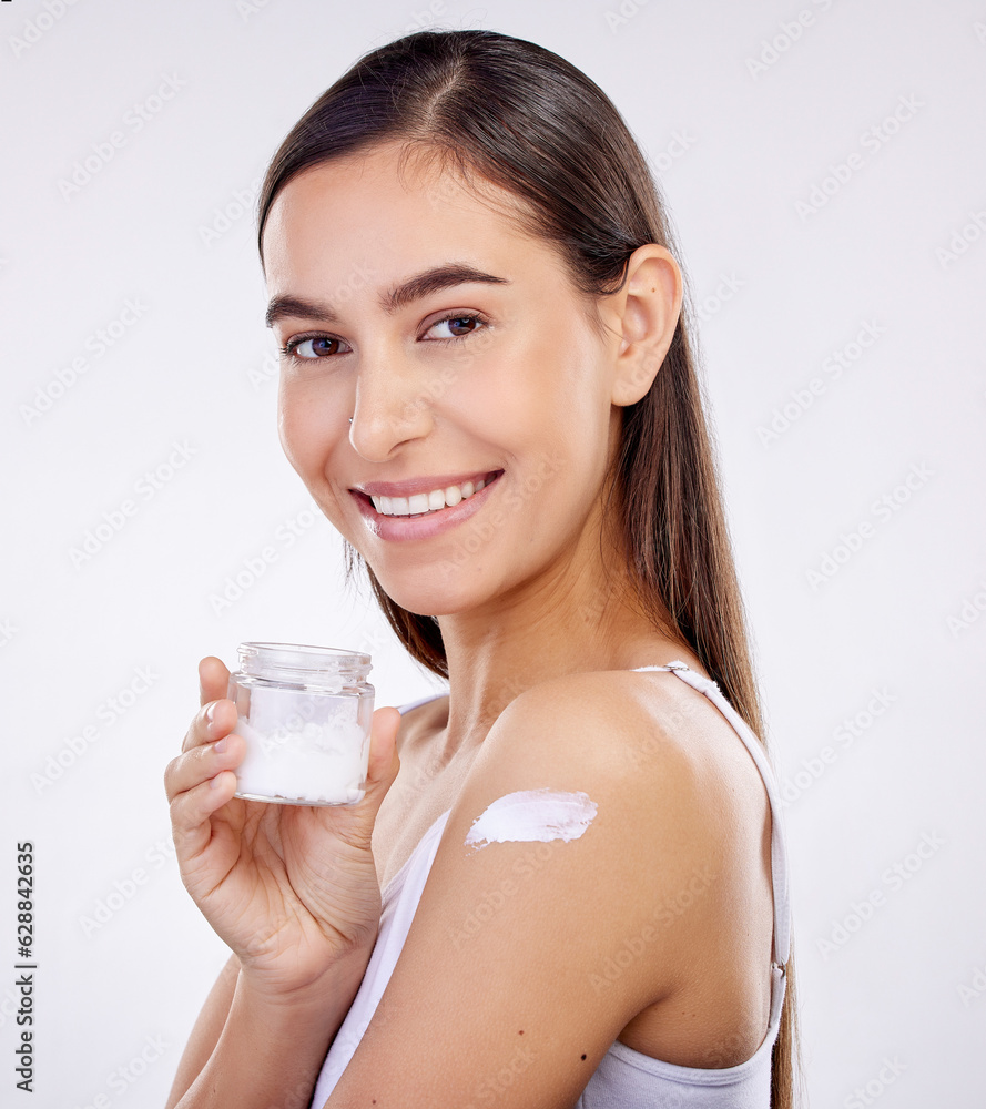 Body, skincare and woman with cream jar isolated on a white background in studio. Portrait, happy an