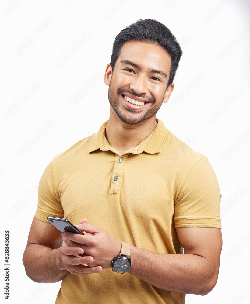 Portrait, smile and Asian man with a smartphone, connection and social media against a white studio 