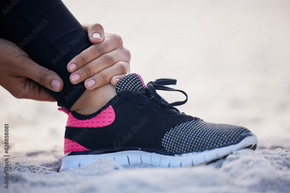 Fitness, ankle pain and sports injury with woman on beach for running, inflammation and accident. Em