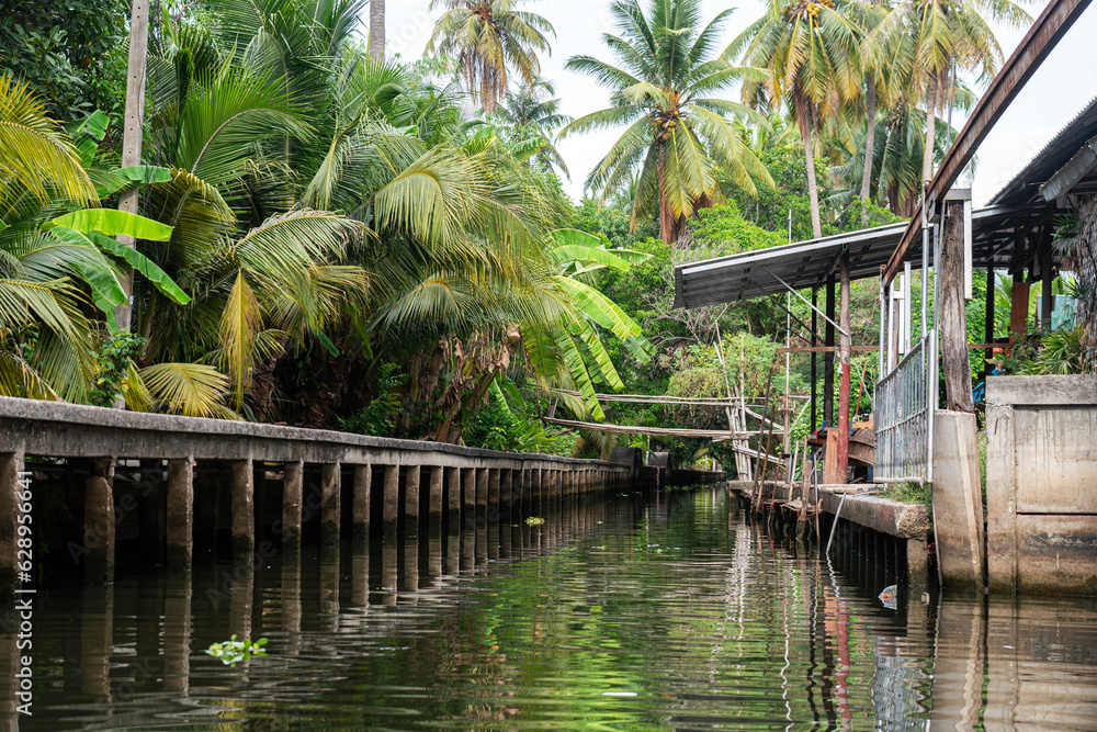 Famous floating market in Thailand, Damnoen Saduak floating market, tourists visiting by boat, Ratch