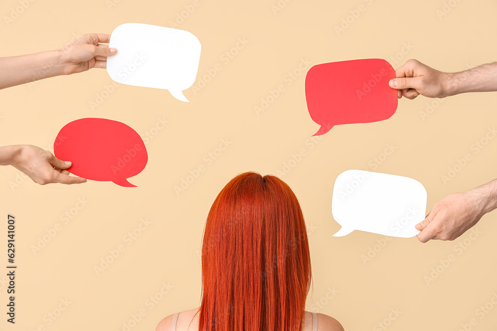 Woman and different hands with speech bubbles on beige background