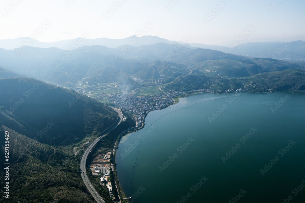 Village and lake in Shuanglang, Yunnan, China.