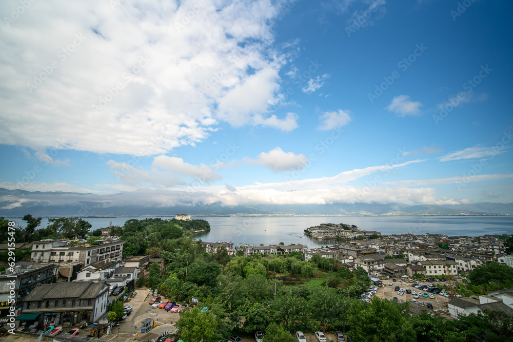 Village and lake in Shuanglang, Yunnan, China.