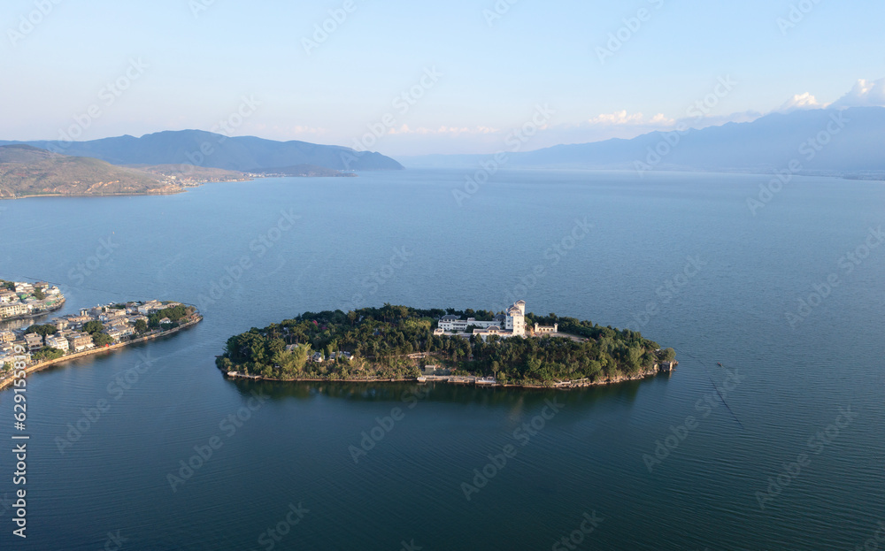 Village and lake in Shuanglang, Yunnan, China.