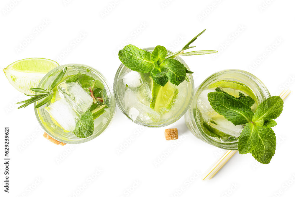 Glasses of tasty mojito isolated on white background