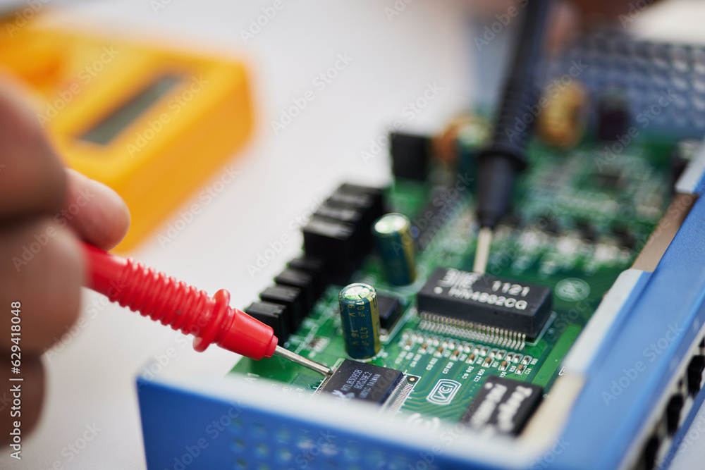 Closeup, motherboard and engineer solder circuit board for technology, electrical hardware or CPU mi