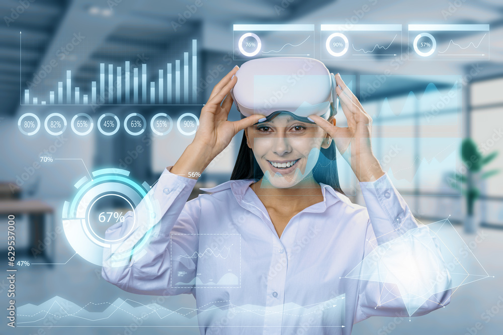 Attractive smiling young european businesswoman with VR glasses and glowing business chart hologram 