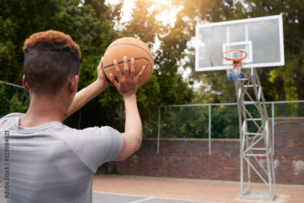 Man, basketball and net outdoor to score points, winning and aim for target from the back. Player, c