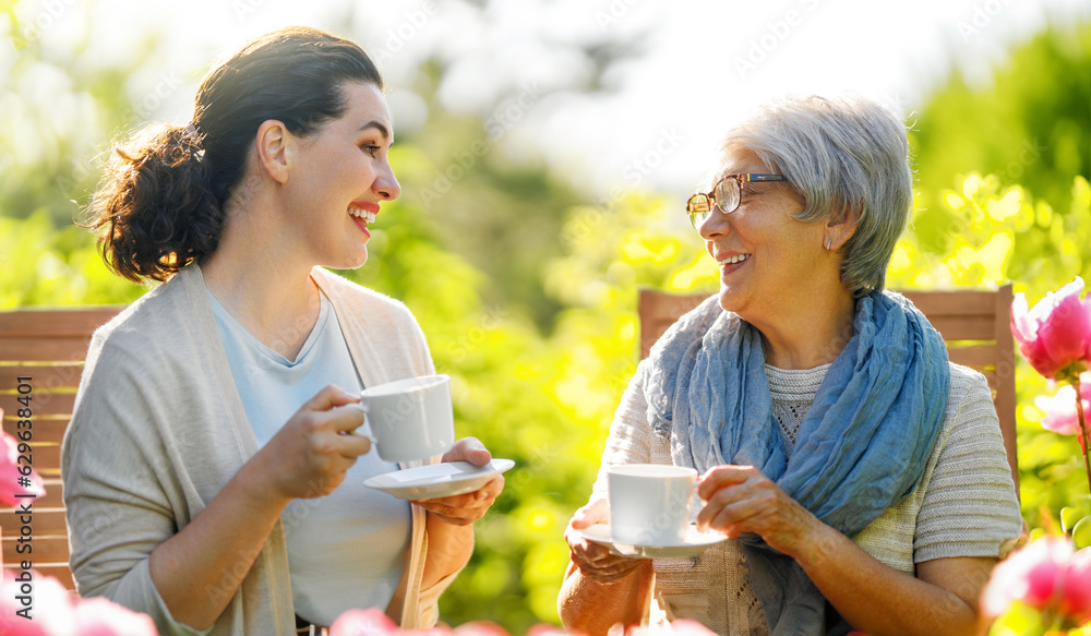 women drinking tea in the garden