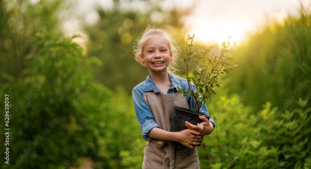 child gardening in the backyard