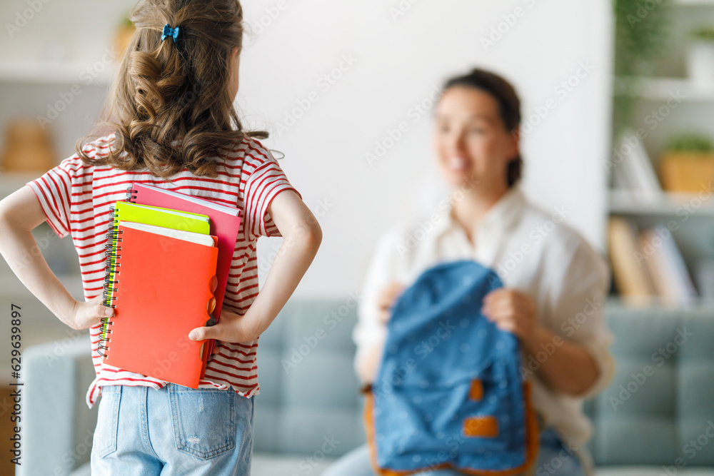 Happy family preparing for school