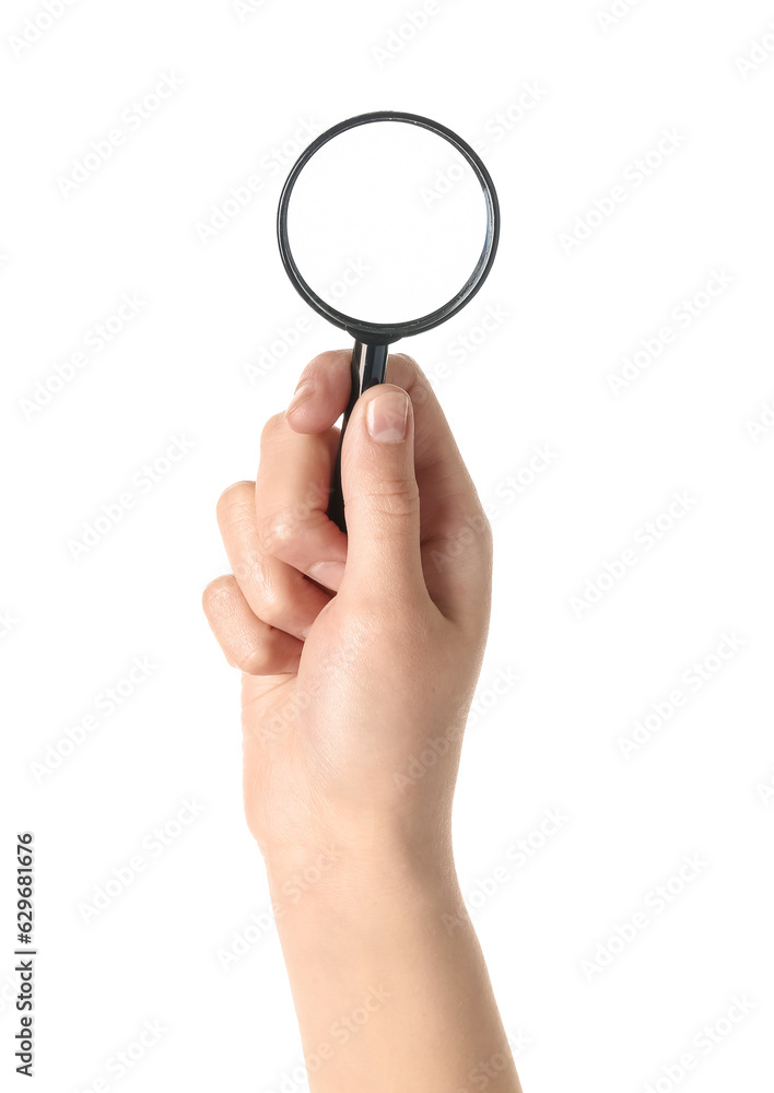 Female hand with mini magnifier isolated on white background