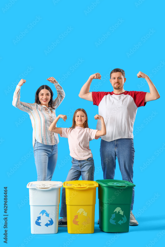 Family with recycle bins showing muscles on blue background