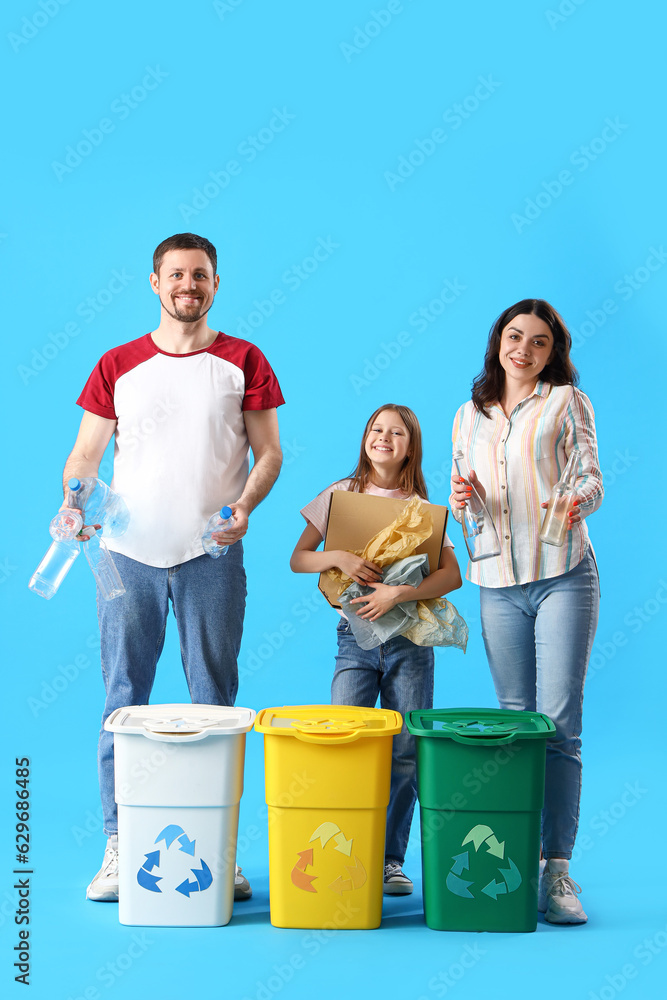 Family sorting garbage with recycle bins on blue background