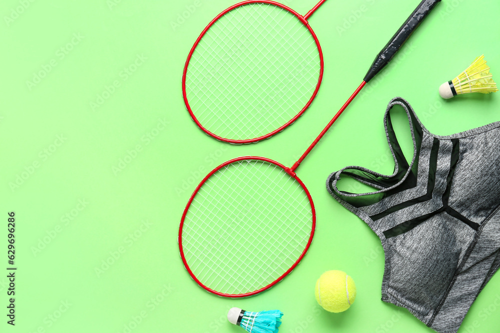 Set of sports equipment and clothes on color background