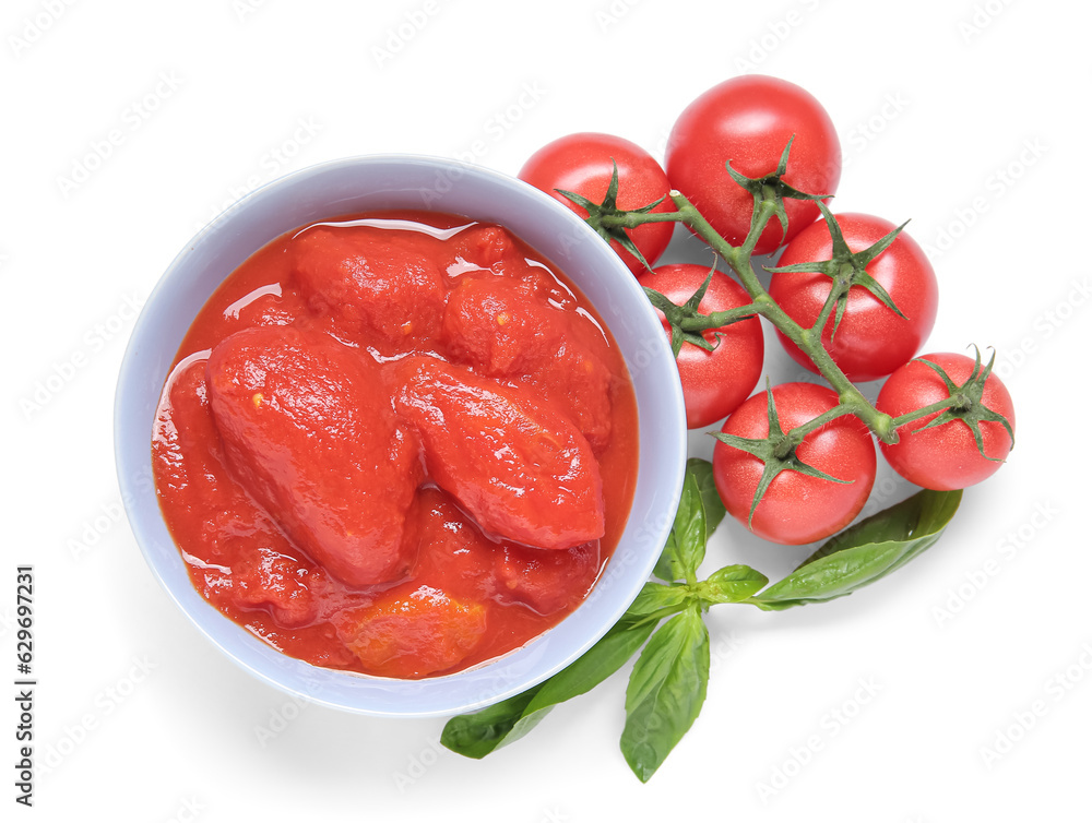 Bowl with canned and fresh tomatoes on white background