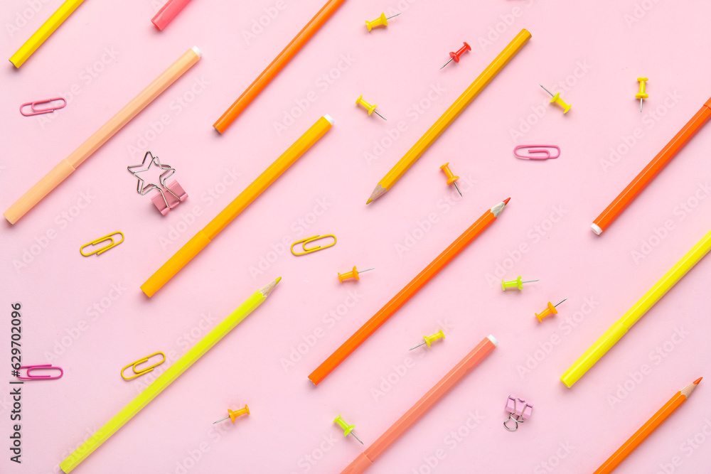 Composition with stationery on pink background