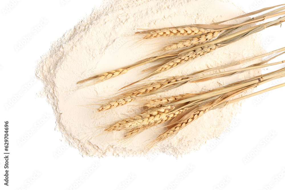 Flour and wheat ears on white background