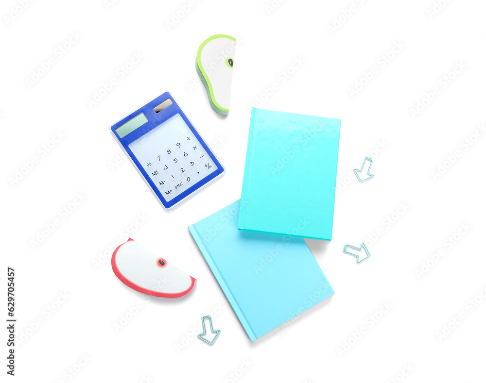 Notebooks and school stationery on white background