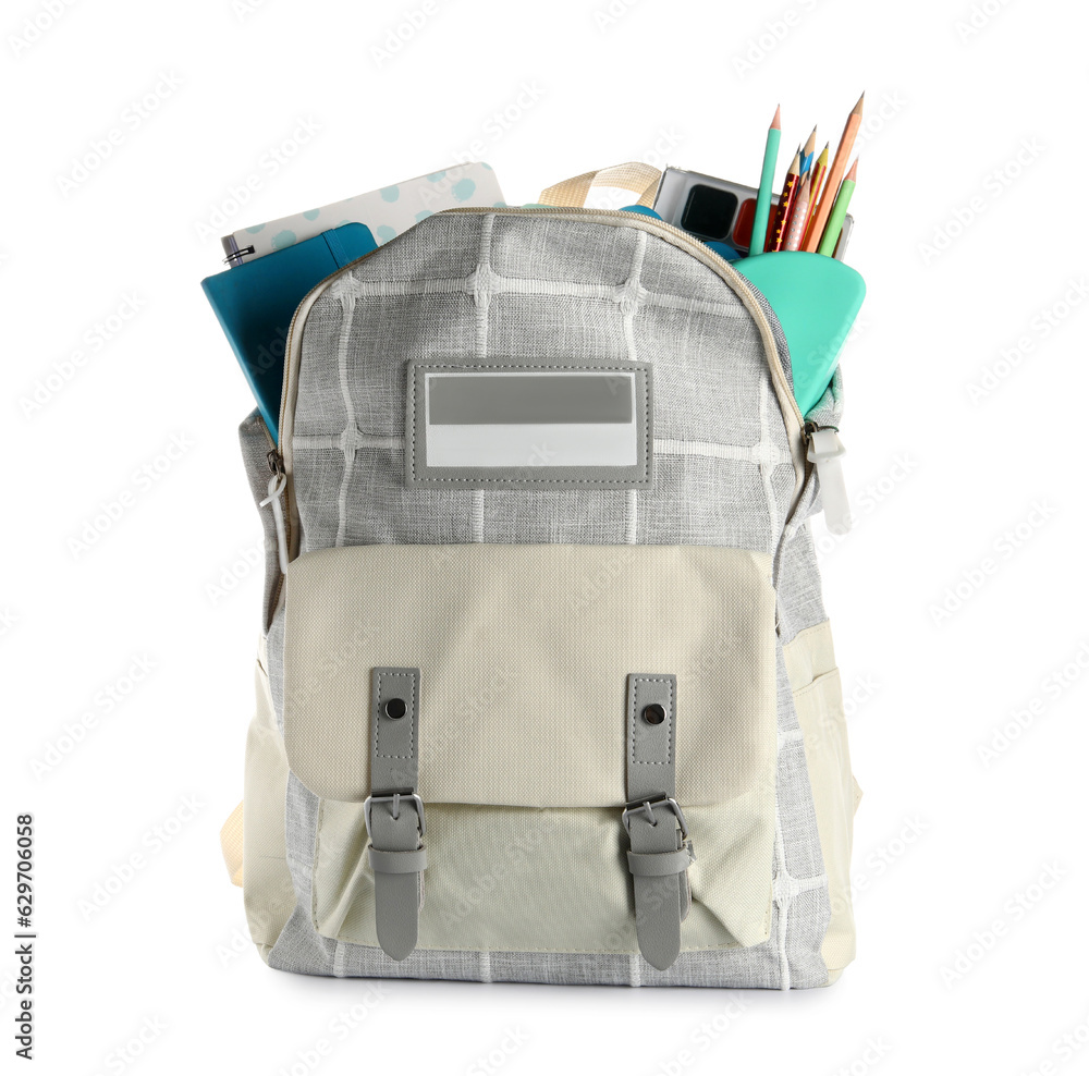 Grey school backpack with notebooks and pencils on white background