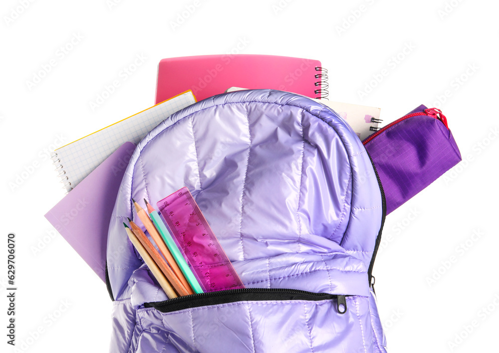 Lilac school backpack with notebooks, pencils and ruler on white background