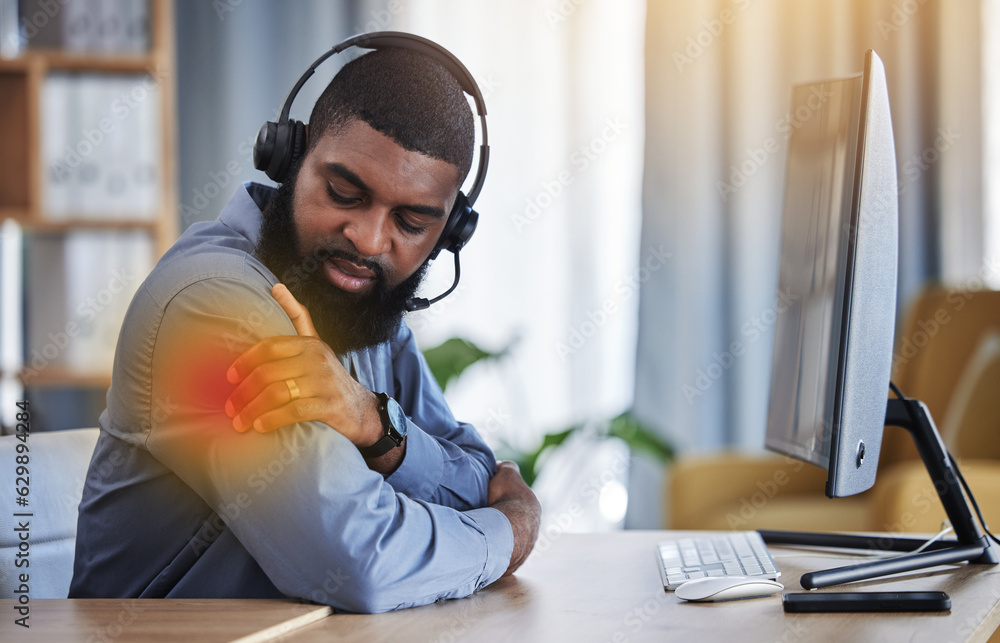 Call center, customer support and black man with shoulder pain, muscle strain and injury at desk. Te