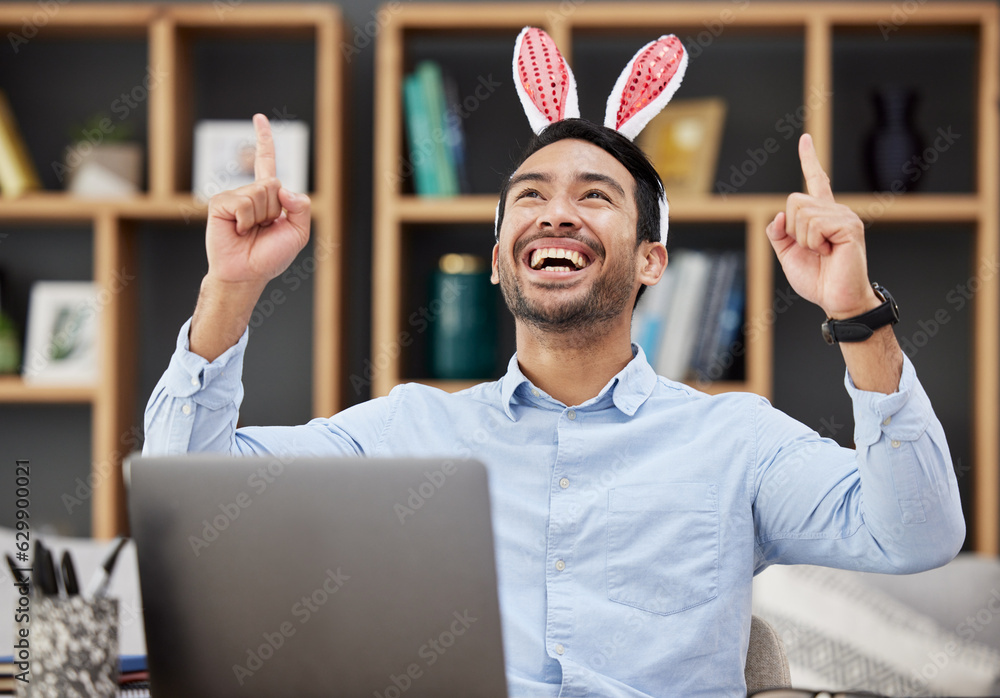 Bunny ears, easter and celebration by business man excited, happy and winning in an office with succ