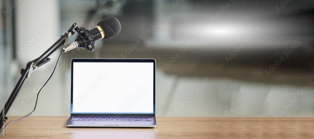 Laptop, screen with mockup and microphone, radio or podcast with audio equipment, technology and adv